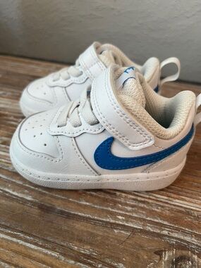 Nike Toddler White Sneakers with Blue Swoosh - Velcro